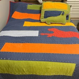 Pottery Barn kids twin size quilt with standard sham and dog pillow.